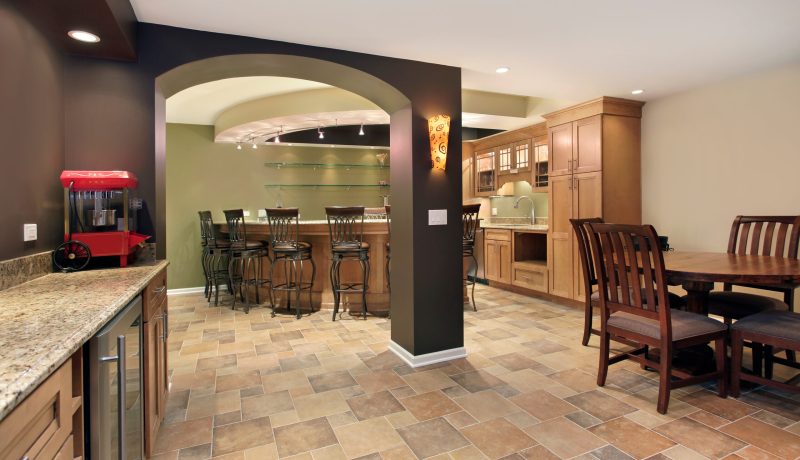 Lower level basement with bar and chairs